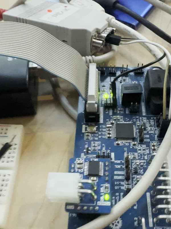 The Motor Drive Interface board with a PCAN-USB adapter and a J-Link attached